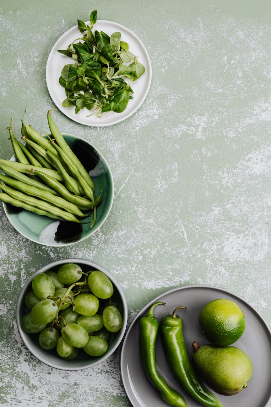 fruits and vegetables on plates and trays